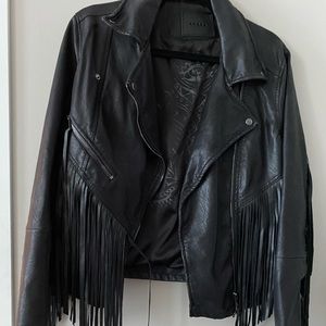 Black fringe faux leather jacket